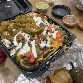 Tacos Los Primos - Nachos for $13. Chips not good. - Food Trucks Near Me - Covina, California Tacos Los Primos - Nachos for $13. Chips not good. - Food Trucks Near Me - Covina, California