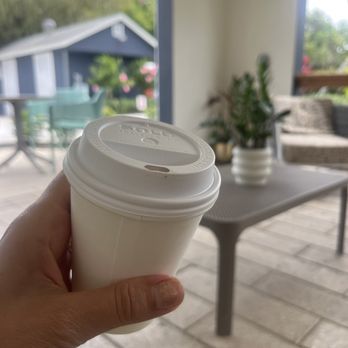 Gilbert's Coffee Bar - Sunset Bay - Americano with vanilla syrup. Outdoor patio area. - Coffee & Tea Near Me - Stuart, Florida