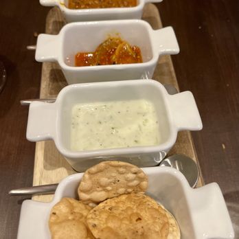Indus Progressive Indian - The smoky dal, mango chutney, raita, and crisp papad that came with the Navaabi Risotto - Kebab Near Me - Highland Park, Illinois Indus Progressive Indian - The smoky dal, mango chutney, raita, and crisp papad that came with the Navaabi Risotto - Kebab Near Me - Highland Park, Illinois