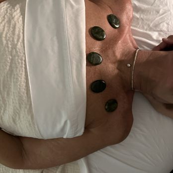 Alaska Massage Studio - Advanced Muscle Therapy: Our Hot Stone Massage, featuring authentic Jade Stones - Massage Therapy Near Me - Wasilla, Alaska