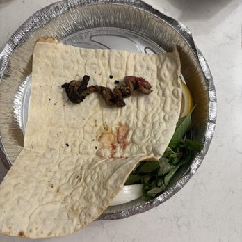 Divan Grill & Lounge - This was supposed to be one skewer of beef liver. This is a scam! - Mediterranean Near Me - Tustin, California