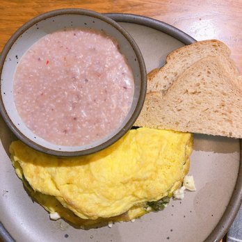 Chestnut - steak and chimichurri omelette with pink cheese grits and [undertoasted] toast - New American Near Me - Asheville, North Carolina