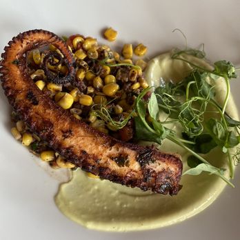 Mythos Restaurant - Grilled octopus with corn appetizer. Small, but very good! - New American Near Me - Orlando, Florida Mythos Restaurant - Grilled octopus with corn appetizer. Small, but very good! - New American Near Me - Orlando, Florida