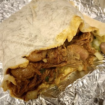 Yuca's Pasadena - Half of a Cochinita Pibil burrito - Mexican Near Me - Pasadena, California Yuca's Pasadena - Half of a Cochinita Pibil burrito - Mexican Near Me - Pasadena, California