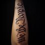 Photo of A Touch of Ink Tattoo