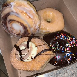 HUGE doughnuts and cinnamon roll. Yum! HUGE doughnuts and cinnamon roll. Yum!