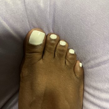 Tiffany's Nails & Spa - Right feet big toe with line under the paint. - Nail Salons Near Me - Wolcott, Connecticut Tiffany's Nails & Spa - Right feet big toe with line under the paint. - Nail Salons Near Me - Wolcott, Connecticut