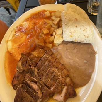 Yellow Rose - Pork chop huevos rancheros - Tex-Mex Near Me - New York, New York