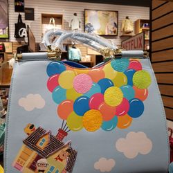 BoxLunch - I don't carry a purse but MAN! this one makes me want to start. How cute!