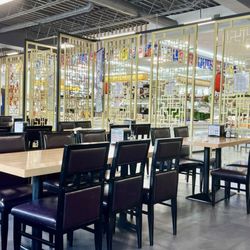Dining area with buffet behind the divider.