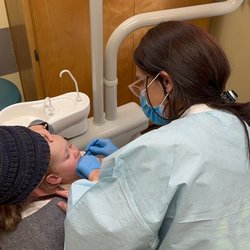Dalia Nosrati Cohen, DDS - Happy Smiles Dental - Dr. Dalia checking my babies teeth and giving her flouride