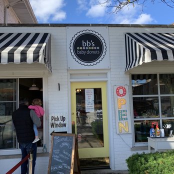 BB'S Baby Donuts - a man and woman standing outside of a store - Donuts Near Me - Western Springs, Illinois