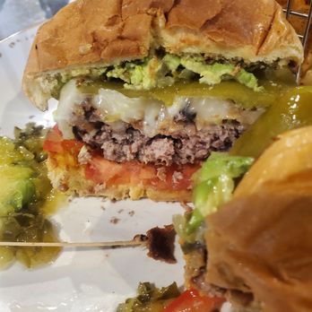 September’s Taproom & Eatery - Chicken fried burger with avocado, Chile and sweet relish - Sports Bars Near Me - Rialto, California September’s Taproom & Eatery - Chicken fried burger with avocado, Chile and sweet relish - Sports Bars Near Me - Rialto, California