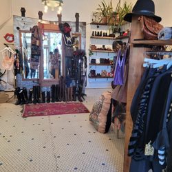 Mercy Vintage - Inside, curated designer and unique vintage clothes, shoes, belts and jewelry.