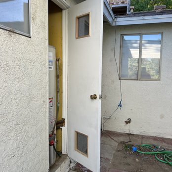 Gutierrez Termite Control - Brand new water heater door installed. - Pest Control Near Me Gutierrez Termite Control - Brand new water heater door installed. - Pest Control Near Me