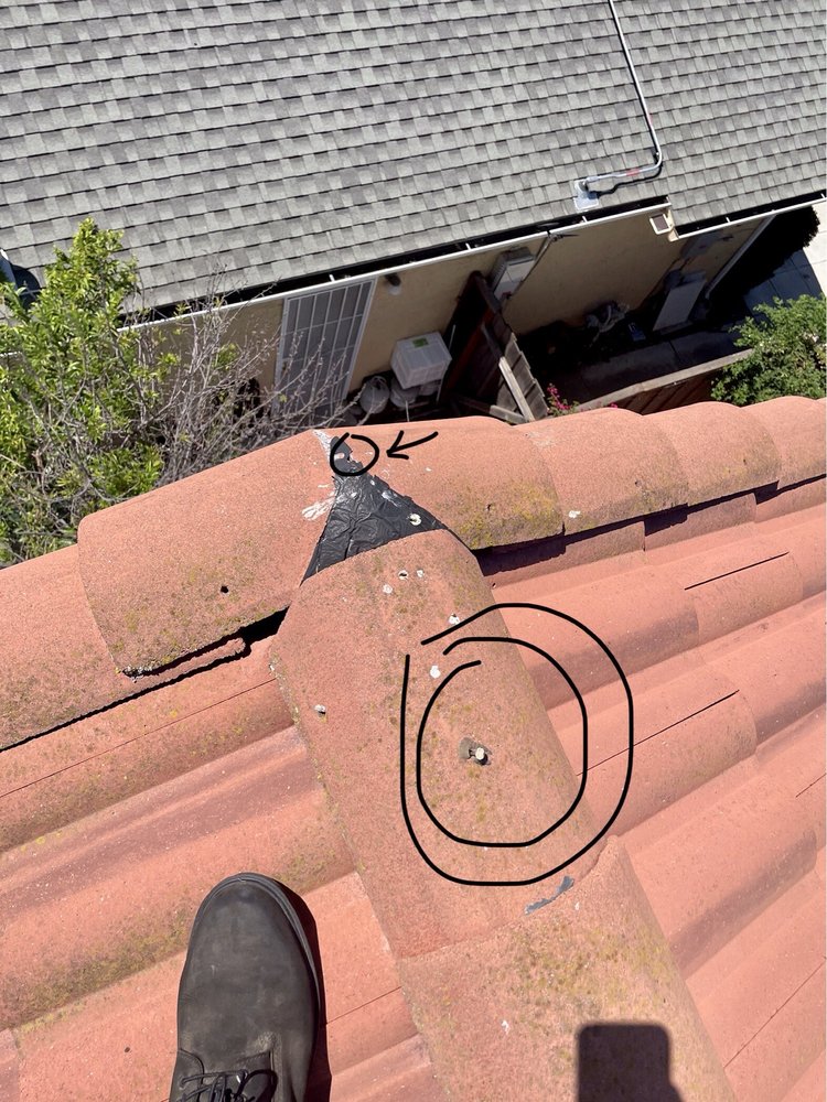 Slide of T D Roofing