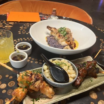 Sushisamba - Ribeye skewers, sea bass skewers, Peruvian corn, chicken teriyaki w purple mashed potatoes. Omg ALL so good! - Asian Fusion Near Me - Las Vegas, Nevada
