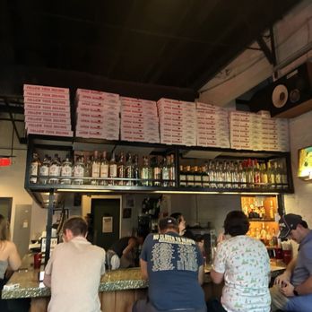 Dicey's Pizza & Tavern - A few bard eats at the entrance, the bar wraps around with more open seats - Pizza Near Me - Nashville, Tennessee Dicey's Pizza & Tavern - A few bard eats at the entrance, the bar wraps around with more open seats - Pizza Near Me - Nashville, Tennessee