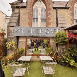 Rye River Cafe - The outdoor eating area with view to the cafe. Astroturf is a good call.