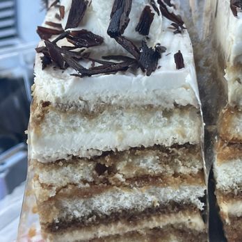 Biscotts Bakery & Cafe - Tiramisu Cake Slice - Cafes Near Me - South Jordan, Utah Biscotts Bakery & Cafe - Tiramisu Cake Slice - Cafes Near Me - South Jordan, Utah