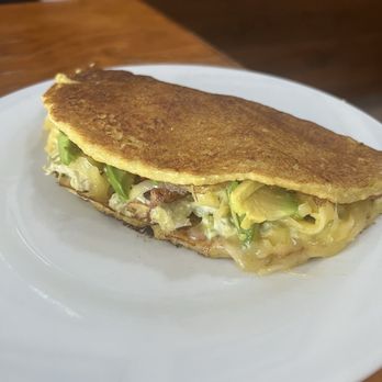 Kaxapa Factory - Cachapa consentida - like an American creamy chicken salad with fried sweet plantains, avocado, and cheese. Outstanding!! - Latin American Near Me - Playa del Carmen, ROO