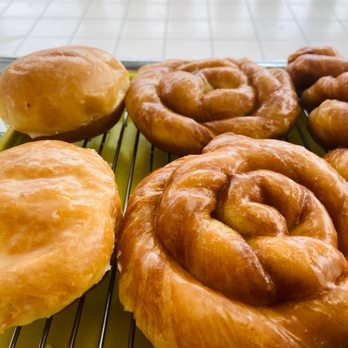 Franz Donuts - a variety of doughnuts on a cooling rack - Donuts Near Me - Katy, Texas
