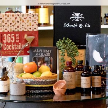 Narrowsburg Proper - a variety of liquors on a table - Specialty Food Near Me - Narrowsburg, New York