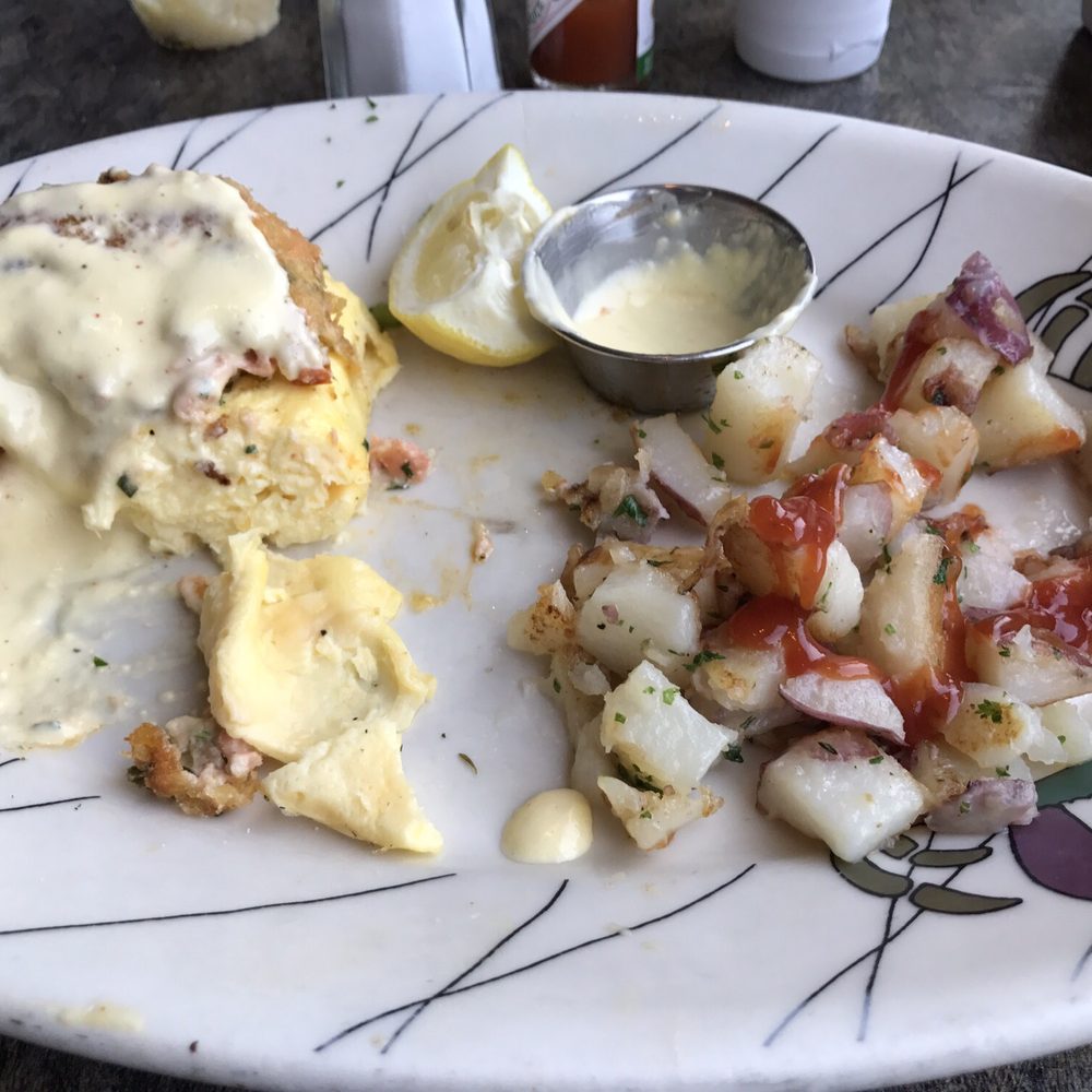 Chinook's - $19 for this hot mess of soggy potatoes, egg beater, and tiny salmon cake. - Seafood Near Me - Seattle, Washington