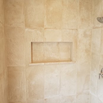 Golden Bear Contracting - Tile shower with recessed niche, bench, and new faucet - General Contractors Near Me