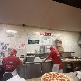two men working in a kitchen