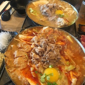 Boiling Point - Hot pots: Miso flaming spicy no fish ball and miso medium spicy no fish ball. Sides: vermicelli, instant noodle, and sliced beef. - Taiwanese Near Me - Tukwila, Washington