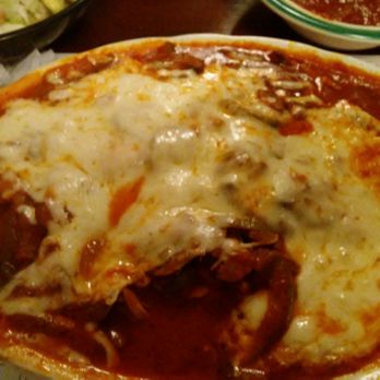 La Bella Sicilia - Under this blanket of cheesy awesomeness is chicken breast cacciatore. Heavy with mushrooms, onions, peppers & the most delicious sauce. - Pizza Near Me - Buffalo, New York La Bella Sicilia - Under this blanket of cheesy awesomeness is chicken breast cacciatore. Heavy with mushrooms, onions, peppers & the most delicious sauce. - Pizza Near Me - Buffalo, New York