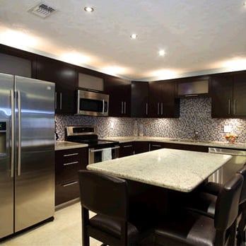 Andino Construction - a modern kitchen with stainless steel appliances - General Contractors Near Me Andino Construction - a modern kitchen with stainless steel appliances - General Contractors Near Me