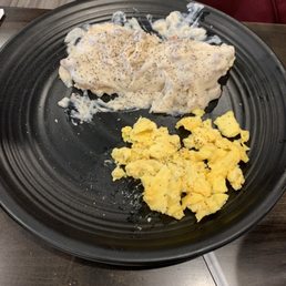 Half order sausage gravy, eggs scrambled w/American cheese. Half order sausage gravy, eggs scrambled w/American cheese.