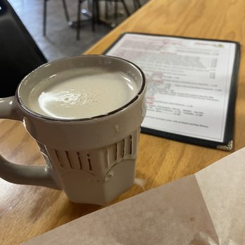 San Luis Cuban Cafe - Cafe con leche (coffee with milk). It's not condensed but just add some sugar. Served in a ceramic mug was a nice touch. - Cuban Near Me - Fort Myers, Florida San Luis Cuban Cafe - Cafe con leche (coffee with milk). It's not condensed but just add some sugar. Served in a ceramic mug was a nice touch. - Cuban Near Me - Fort Myers, Florida