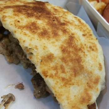 Banana King - Half of the Arepa Steak Sandwich - Fast Food Near Me - Paterson, New Jersey Banana King - Half of the Arepa Steak Sandwich - Fast Food Near Me - Paterson, New Jersey