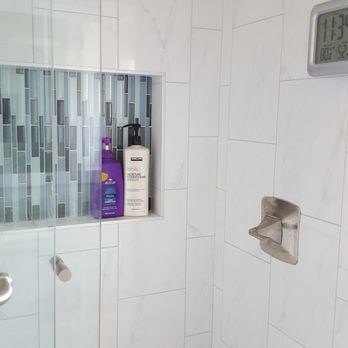 MasterPlan Construction - Kids bath shower niche and tile close-up - General Contractors Near Me