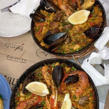 Restaurante Bodega Joan - Top photo: Paella Mixta- with seafood and meat Bottom photo: Paella with seafood only - Tapas Bars Near Me - Barcelona, B Restaurante Bodega Joan - Top photo: Paella Mixta- with seafood and meat Bottom photo: Paella with seafood only - Tapas Bars Near Me - Barcelona, B