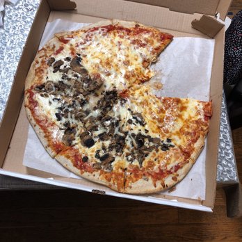 Nut House Pizza - a half eaten pizza in a box - Pizza Near Me - Silver Spring, Maryland Nut House Pizza - a half eaten pizza in a box - Pizza Near Me - Silver Spring, Maryland