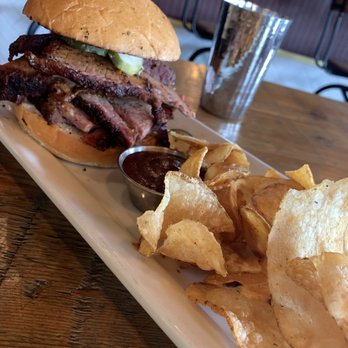 Queens Bully - Brisket Sandwich with sauce on the side - Gastropubs Near Me - Forest Hills, New York Queens Bully - Brisket Sandwich with sauce on the side - Gastropubs Near Me - Forest Hills, New York