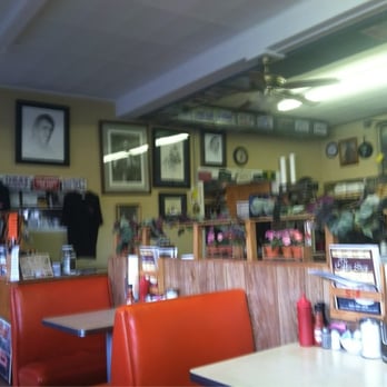 The Coffee Shop - Yes that is Johnny Cash on the wall...and John Wayne..and...err..Robert E. Lee - Coffee & Tea Near Me - Sylva, North Carolina