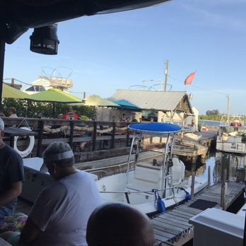 Outriggers Bar and Grill - View of the marina. - Bars Near Me - Micco, Florida Outriggers Bar and Grill - View of the marina. - Bars Near Me - Micco, Florida