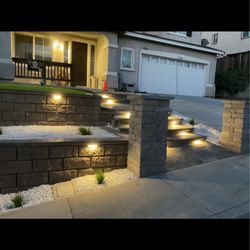 Golden Hills Landscape - Retaining wall, turf, decorative rock and a beautiful lighting!