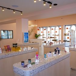 Yerba Buena Dispensary | Cobble Hill Brooklyn - A view from the corner of the store showing counters with dummy packaging on top.