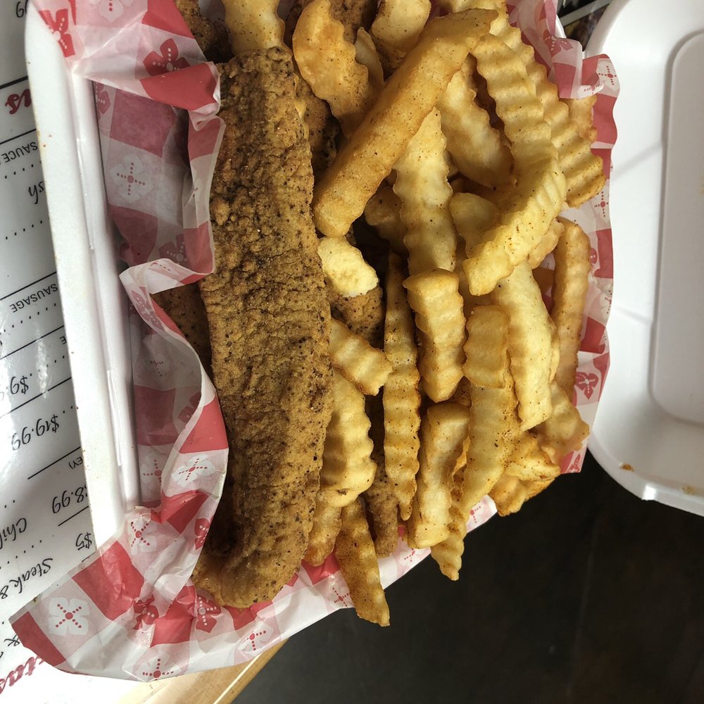Hubs has a shellfish allergy so he opted for fried catfish and fries.
