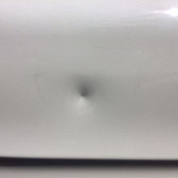 Magic Dent Removal - Before photo of dent on bumper - Mobile Dent Repair Near Me