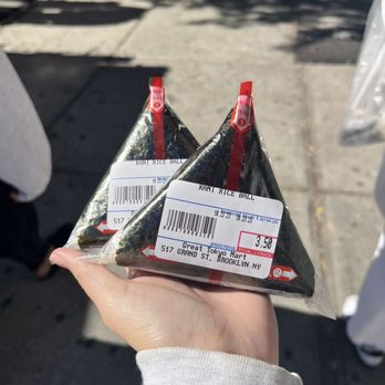 Japanese Market - a person holding a package of sushi - Grocery Near Me - Brooklyn, New York Japanese Market - a person holding a package of sushi - Grocery Near Me - Brooklyn, New York