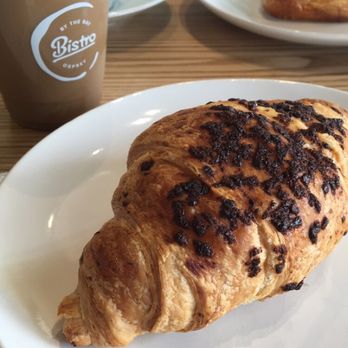 By The Bay Bistro - Iced dirty chai tea latte and chocolate croissant. - Coffee & Tea Near Me - Osprey, Florida By The Bay Bistro - Iced dirty chai tea latte and chocolate croissant. - Coffee & Tea Near Me - Osprey, Florida