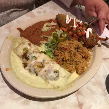 Chuy's - Green Chile Combo - A chicken Chile Relleno and an enchilada. - Mexican Near Me - San Antonio, Texas
