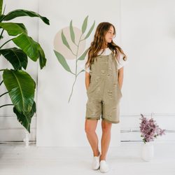 Farmhouse Frocks - This olive green shorts romper is called the Lucy Romper and it's available in all sizes.